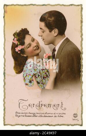 Early 1960's French sentimental tinted greetings card for young lovers, young couple together, about to kiss,Tendrement, circa 1962, France Stock Photo