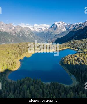 Valtellina, lake Palù in Valmalenco. Aerial view from a drone Stock Photo