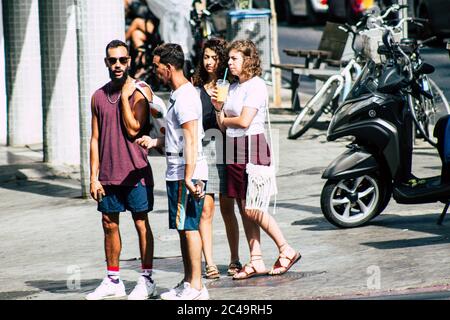 Tel Aviv Israel July 16, 2019 View of unknown people walking in the streets of Tel Aviv in the afternoon Stock Photo