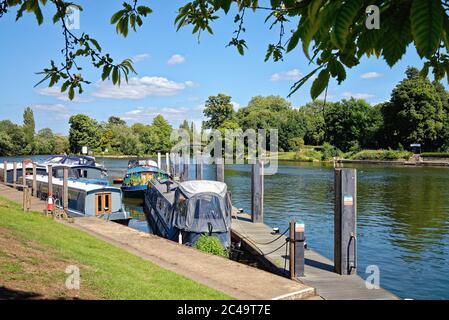 The River Thames by the entrance to Shepperton lock on a sunny summers day Surrey England UK Stock Photo