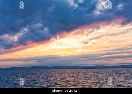 Beautiful colors after sunset over Lake Balaton before storm in Hungary Stock Photo