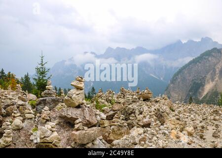 Stone tower made by tourists in mountains Stock Photo
