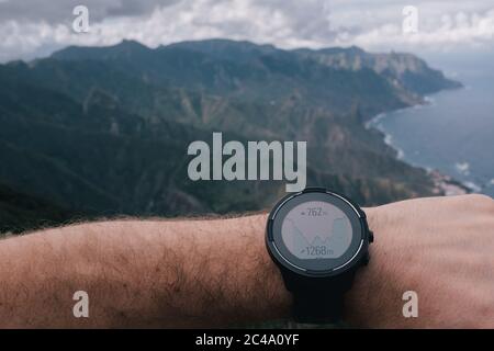 Runner checking progress on smart watch Stock Photo