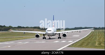 The RAF Voyager used by the Prime Minister and the royal family on the runway at Cambridge airport where it has been repainted in the colours of the Union flag at a cost of almost £1 million. Stock Photo