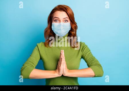 Close-up portrait of her she nice lucky wavy-haired girl asking begging favor wearing safety mask stop pandemia mers cov health care isolated bright Stock Photo