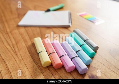 Drawing on a white sheet with a color highlighter Stock Photo