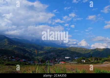 Beautiful view of houses and mountains as the background from Kundasang, Sabah. Stock Photo