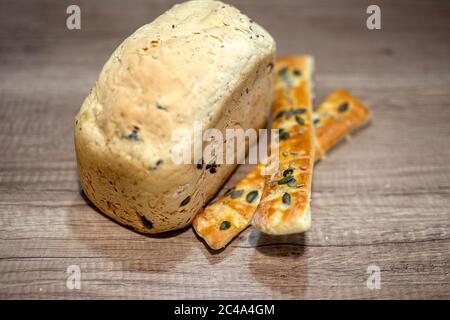 Molded home made bread and roll on table Stock Photo