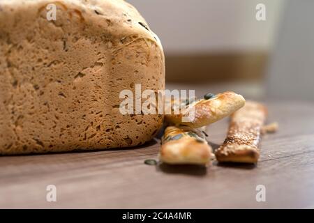 Molded home made bread and roll on table Stock Photo