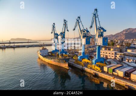 Big port cargo cranes in Palermo, Italy in a beautiful summer day Stock Photo