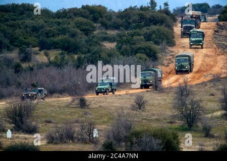 Askos, Greece - Feb 14, 2020: military vehicles takes part at a international military exercise with real fire (Golden Fleece -20) between Greek , US Stock Photo