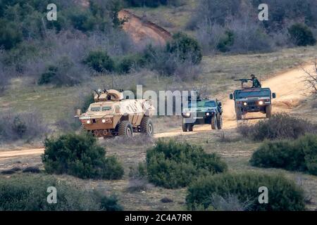 Askos, Greece - Feb 14, 2020: military vehicles takes part at a international military exercise with real fire (Golden Fleece -20) between Greek , US Stock Photo