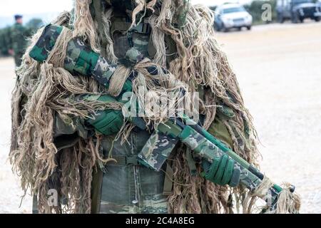 Askos, Greece - Feb 14, 2020: military commando with camouflage takes part at a international military exercise with real fire (Golden Fleece -20) bet Stock Photo