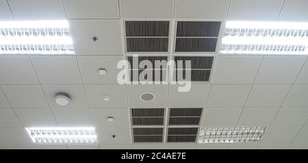 Air conditioning mask, lighting and modern equipment On the ceiling, selected switch-off some lighting for energy save Stock Photo