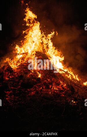 Big bonfire burning in the night. Stock Photo