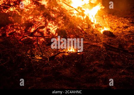 Details of the ashes on the ground during a fire. Stock Photo