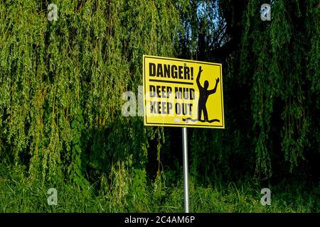 Danger, Deep Mud, Keep Out, sign, John Hendry Park, Trout Lake, Vancouver, British Columbia, Canada Stock Photo