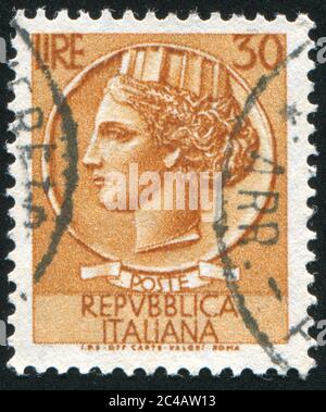 ITALY - CIRCA 1953: stamp printed by Italy, shows Female head, circa 1953 Stock Photo