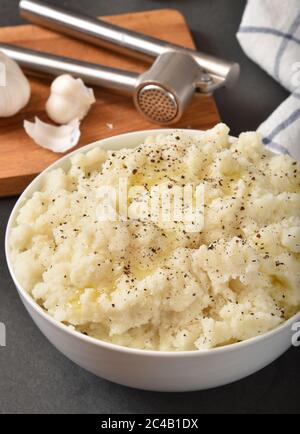 A bowl of fresh homemade garlic mashed potatoes Stock Photo