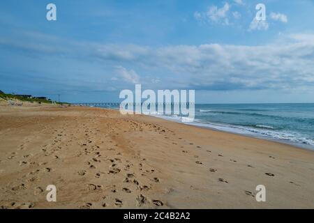 A wide angle photo of an almost empty  beach in Duck, NC. Stock Photo