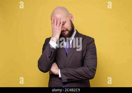 mature man trying to concentrate, or suffering from headache Stock Photo