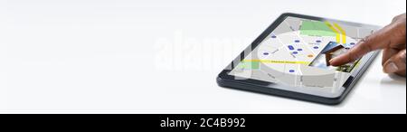 African American Woman Using Real Estate Map On Tablet Computer Stock Photo