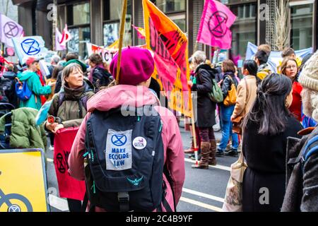 LONDON/ENGLAND – FEBRUARY 22 2020: Extinction Rebellion protesters during the February 2020 March along with Parents 4 Future Stock Photo