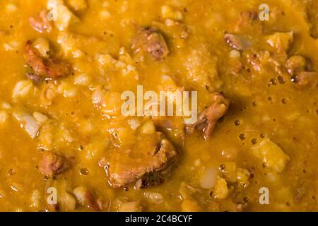 Locro, a traditional argentinian food made of bean, vegetables and pork meat. Close up view Stock Photo