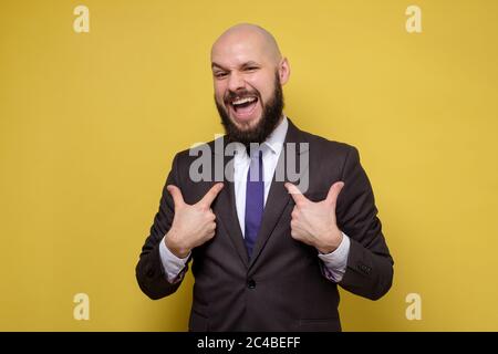 man pointing to himself with question if he did something wrong. Stock Photo