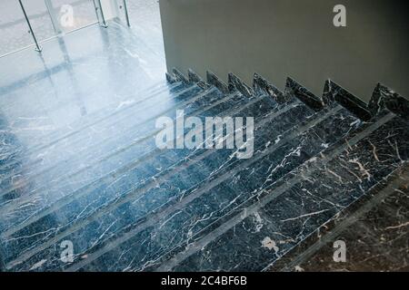 marble staircase. Classic architecture. Close-up photo of public interior fragment.Flight of stairs, green marble stairs, hotel,house in modern style Stock Photo