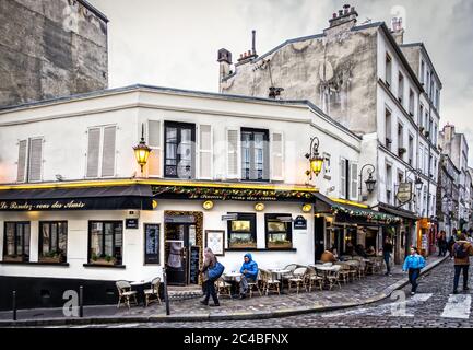 Paris, France, Feb 2020, urban scene  by the bar-restaurant “Le Rendez-Vous Des Amis” in the heart of Montmartre district Stock Photo