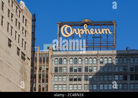 Los Angeles, California, USA- 11 June 2015: Buildings at Hill Street. Big Orpheum advertisement on the roof. Stock Photo