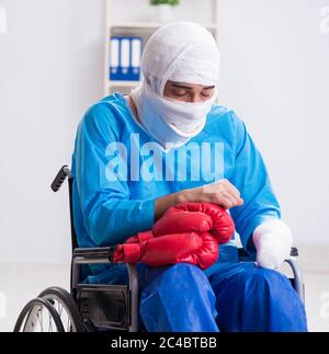 The injured boxer recovering in hospital Stock Photo