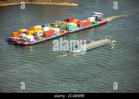 container ship on Rhine river, 07.04.2019, aerial view, Germany, North Rhine-Westphalia, Ruhr Area, Voerde Stock Photo