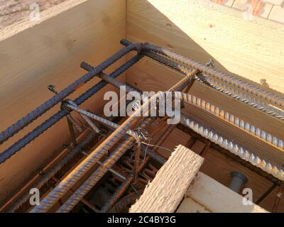 Removable wooden formwork for monolithic reinforced concrete pouring in construction site Stock Photo