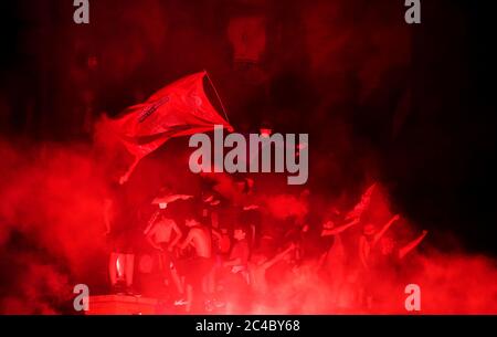 Liverpool fans celebrate outside Anfield, Liverpool. Stock Photo