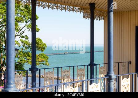Southend Pier, framed by Cliff Lift, above Three Shells Beach Lagoon on Western Esplanade, Southend on Sea, Essex, UK on sunny day Stock Photo