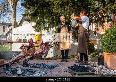 Michelin Star Chef Rodolfo Guzman preparing Lamb grilled in Style ao Patagonia on the Rheingau Gourmet Festival in Hattenheim, Eltville am Rhein, Germany Stock Photo