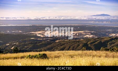 Aerial view of part of Silicon valley, with Stanford University, Palo Alto and Menlo Park spread along the shores of San Francisco Bay; Mount Diablo r Stock Photo