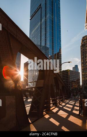 Golden Hour in Chicago. Walking Across the Historic City Bridges in Downtown. Stock Photo