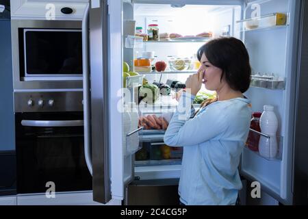 Rotten Food Bad Smell Or Stink In Refrigerator Or Fridge Stock Photo