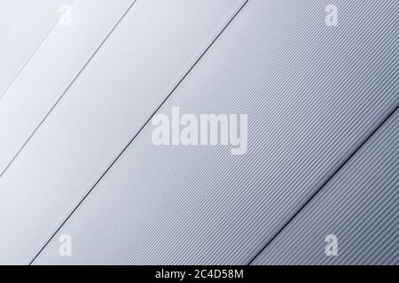 Gray corrugated Metal Sheet Wall Background with shiny reflection gradation Stock Photo