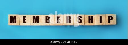 Membership word on wooden cubes on sky blue background. Business concept Stock Photo