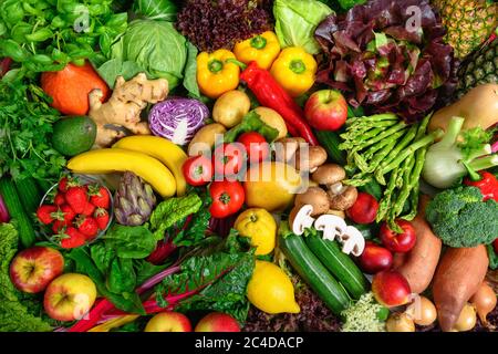 Pile of fruits and vegetables in many appetizing colors, shot from above, inviting to lead a healthy plant-based lifestyle and self-care Stock Photo