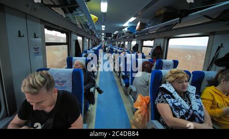 Ankara, Turkey - January 9, 2020: Wagon of a passenger train with passengers in Turkey. Stock Photo