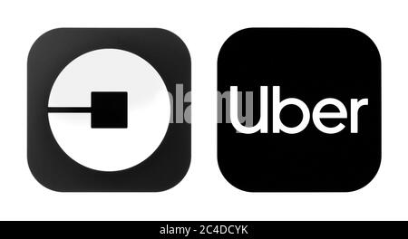 Kiev, Ukraine - November 02, 2019: Collection of popular old & new travel Uber icons printed on paper. Uber is an American worldwide online transporta Stock Photo