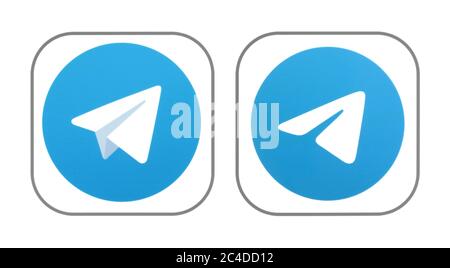 Kiev, Ukraine - November 02, 2019: Old and New icons of Telegram app, printed on white paper. Telegram is a cloud-based instant messaging and voice ov Stock Photo