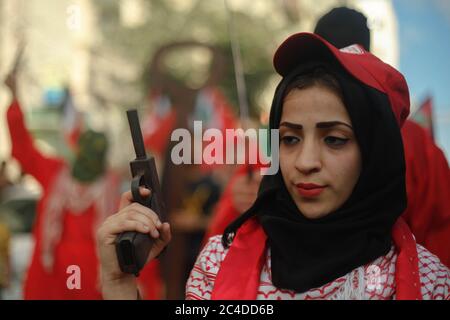 Gaza, Albania. 25th June, 2020. Palestinians demonstrate organized by the Popular Front for the Liberation of Palestine in the Sheikh Radwan neighborhood in Gaza City, against Israel's plans to annex parts of the occupied West Bank on Gaza Strip. (Photo by Ramez Habboub/Pacific Press) Credit: Pacific Press Agency/Alamy Live News Stock Photo