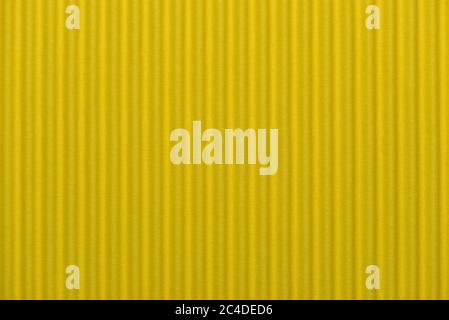 Corrugated cardboard seamless background - texture pattern for continuous replicate. Textured corrugated striped cardboard green Stock Photo