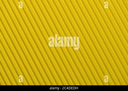 Corrugated cardboard seamless background - texture pattern for continuous replicate. Textured corrugated striped cardboard green Stock Photo